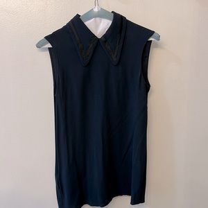 Enchanting Elegance: Unveiling a Navy Blue Miu Miu Pearl-Adorned Sleeveless Top!
